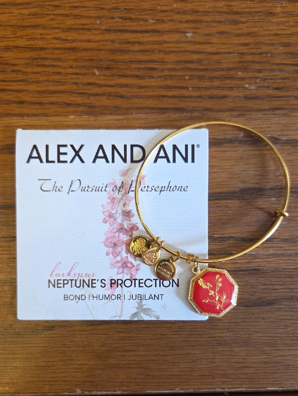 Alex and Ani Gold Tone Bracelet with Red Octagon Floral Charm